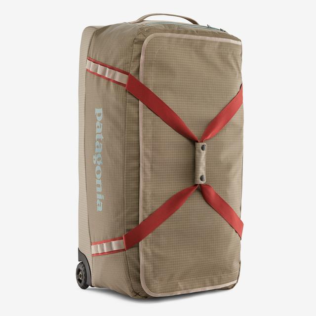patagonia black hole wheeled duffel - 100l JanSport Agave Backpack - GLoomis and reinforced haul handles Color:Simms Orange